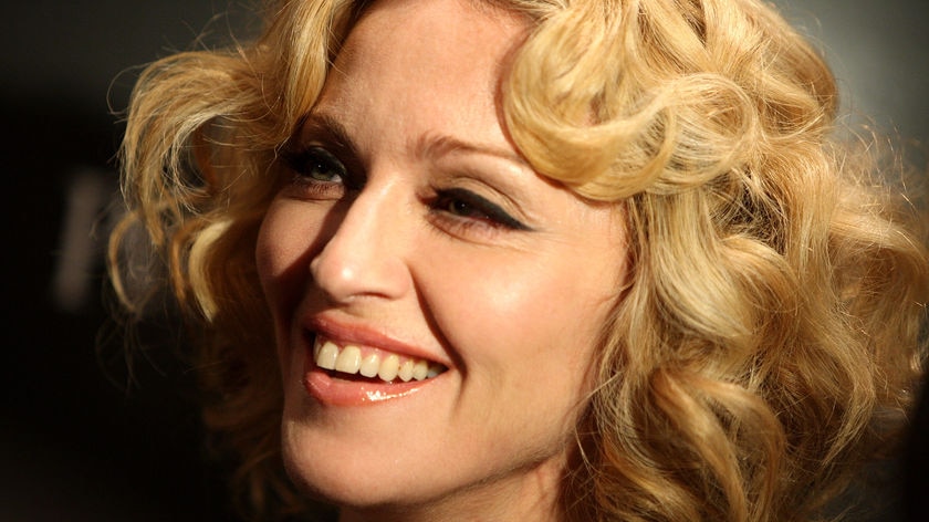 Pop queen: Madonna will be inducted into the Rock and Roll Hall of Fame by singer Justin Timberlake (file photo)