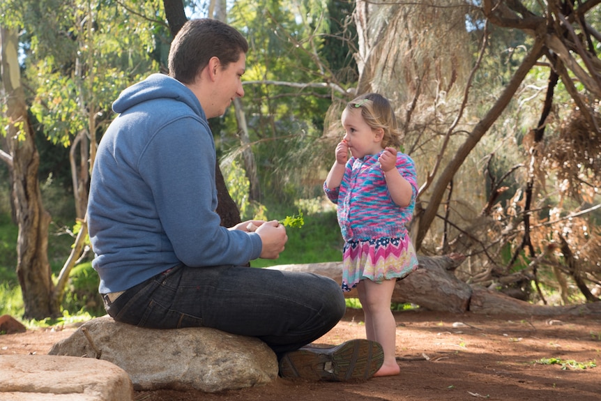 David and Valerie Thomaselli enjoy nature play on the creek island.