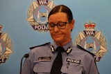 Assistant regional commissioner Jo McCabe looking down with her eyes closed.