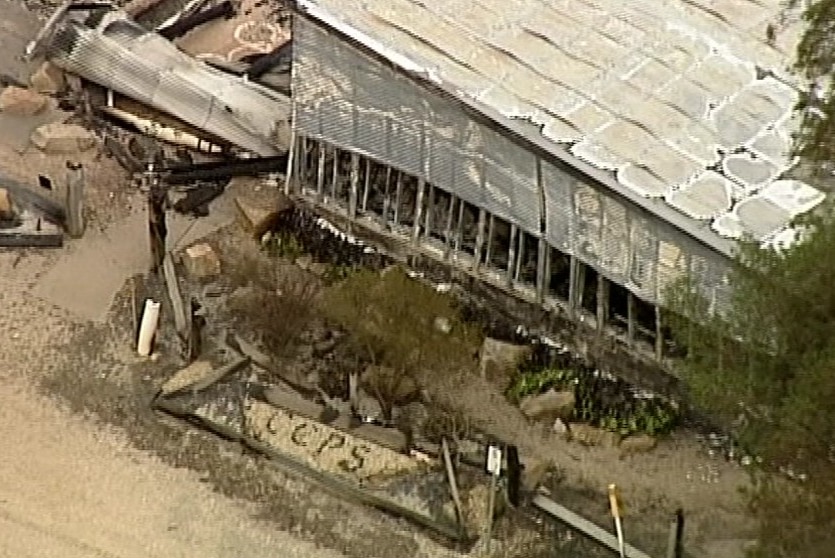 The initials CCPS close to fire damaged buildings at Clifton Springs.