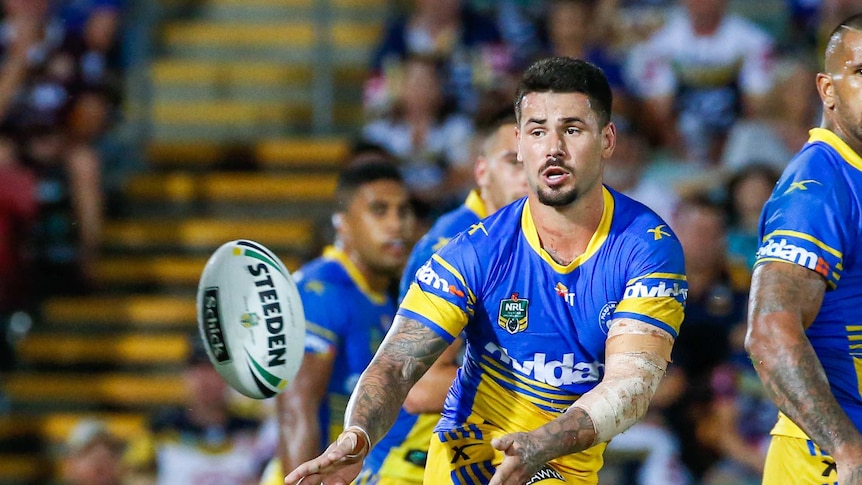 Nathan Peats of Parramatta offloads the ball