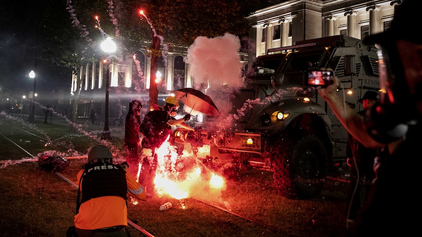 Incendiary devices go off in front of an armoured vehicle in Wisconsin.