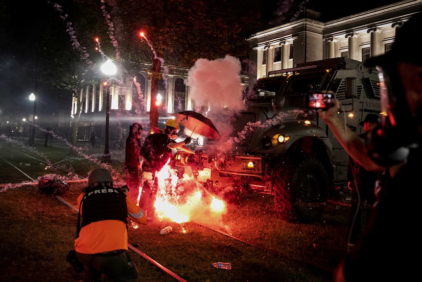 Incendiary devices go off in front of an armoured vehicle in Wisconsin.