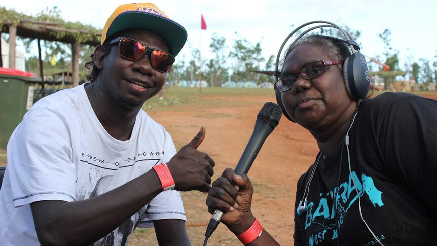 Ms Nulpinditj doing an annual, live outside broadcast at Garma Festival.