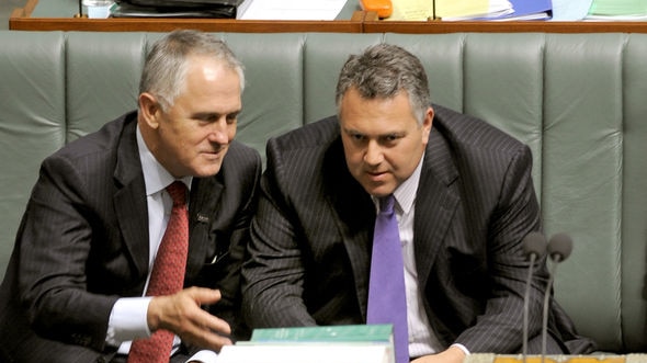 Opposition Leader Malcolm Turnbull (left) speaks treasury spokesman Joe Hockey
