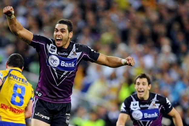 Greg Inglis celebrates his field goal as team-mate Billy Slater looks on