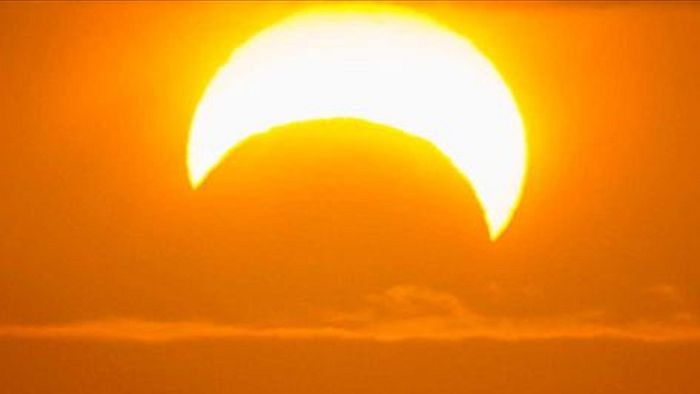 A partial solar eclipse creates a 'crescent sun' sun effect, date unknown.