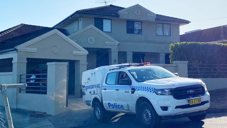 A house with a police car outside