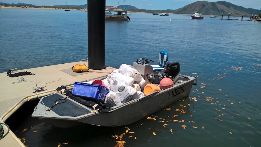 small boat with rubbish