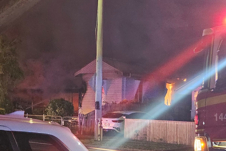 Photos of a house fire, smoke billowing onto a suburban street, police lights and flames through an open window.