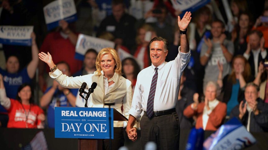 Mitt Romney and his wife Ann Romney appear at a campaign rally