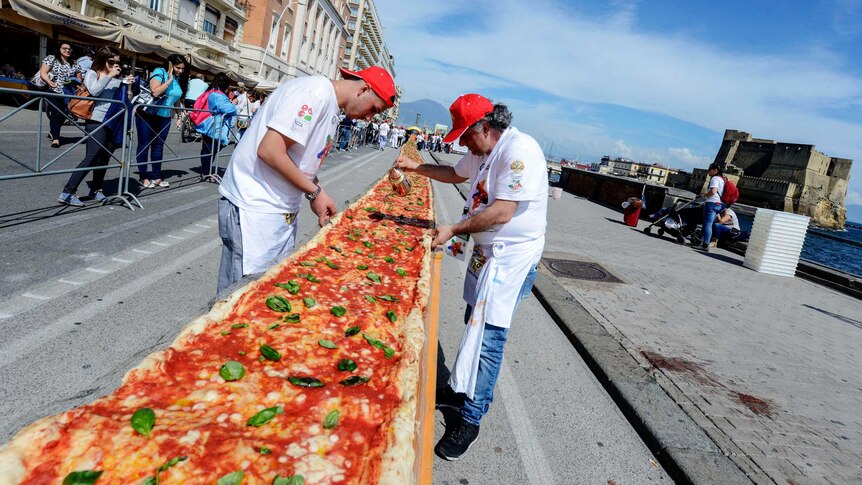 Naples: Home of pizza smashes record with mile-long margherita - ABC News
