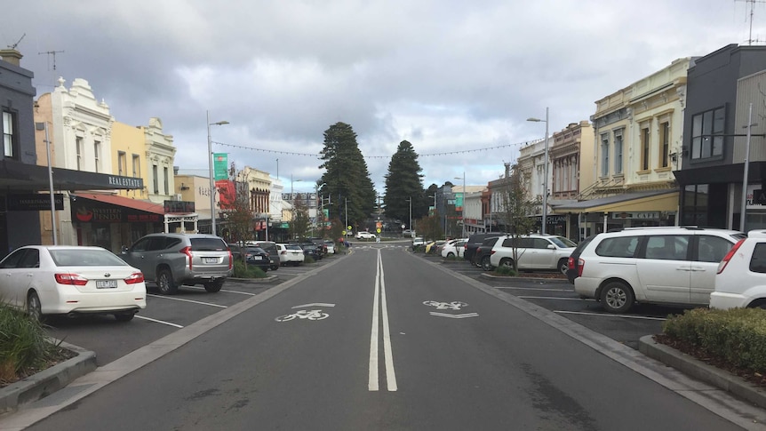 A busy street in a regional city.