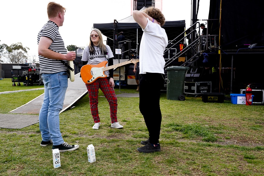 Young band Chelsea Manor wait backstage for their first performance as a band.