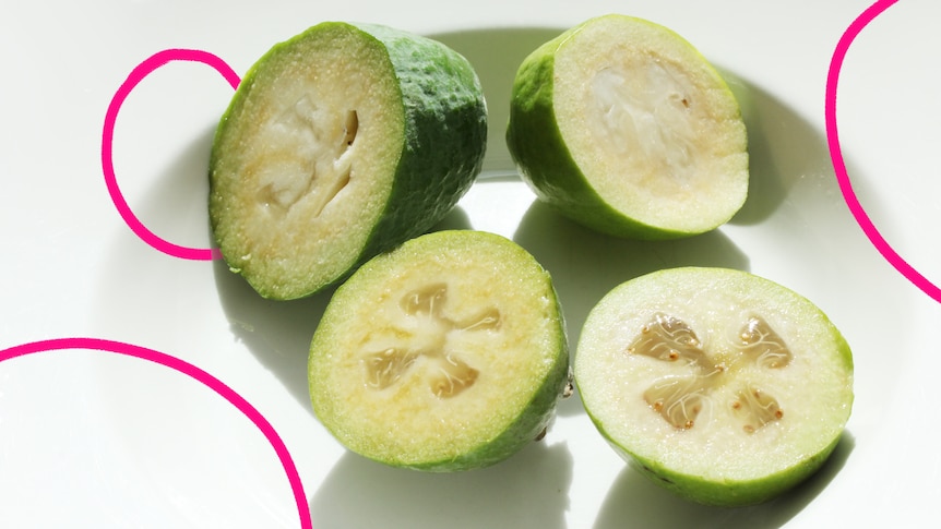 Four feijoas cut in half demonstrating the different stages of ripeness. As the feijoa ripens the centre becomes soft and transl