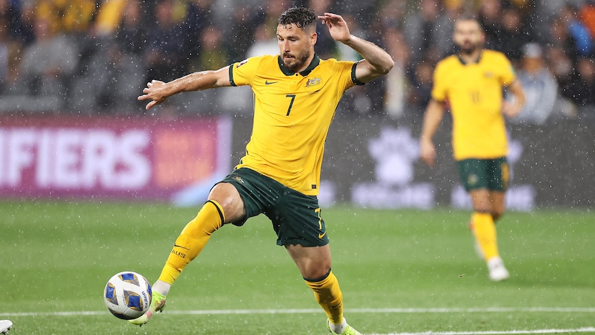 Socceroo Mathew Leckie stretches for the ball during the FIFA World Cup AFC Asian Qualifier match against Saudi Arabia