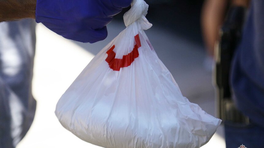 A plastic bag with a white substance in it