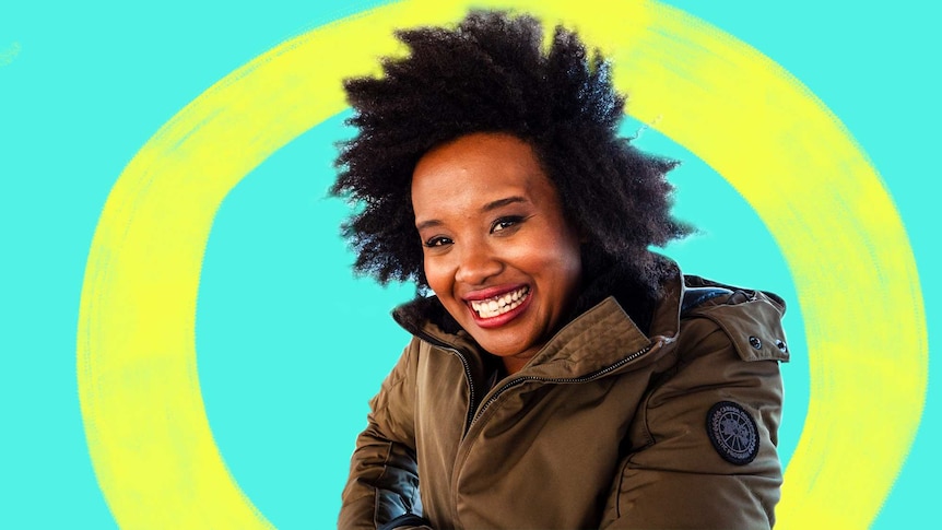Portrait of presenter Faustina Agolley smiling, a bright blue background behind her.