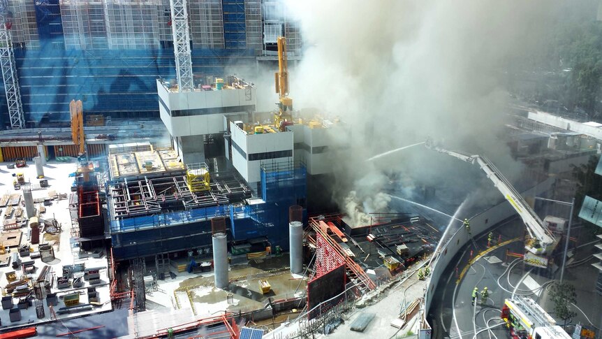 Firefighters tackle a blaze at the Barangaroo construction site in the Sydney CBD.