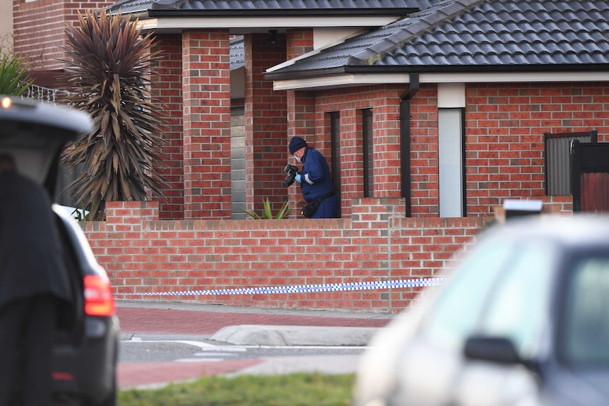 Victoria Police at the scene of a shooting at a home in Roxburgh Park, north of Melbourne.