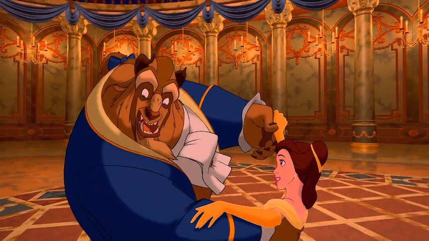 Cartoon image of a princess in a yellow dress dancing with a beast in a suit