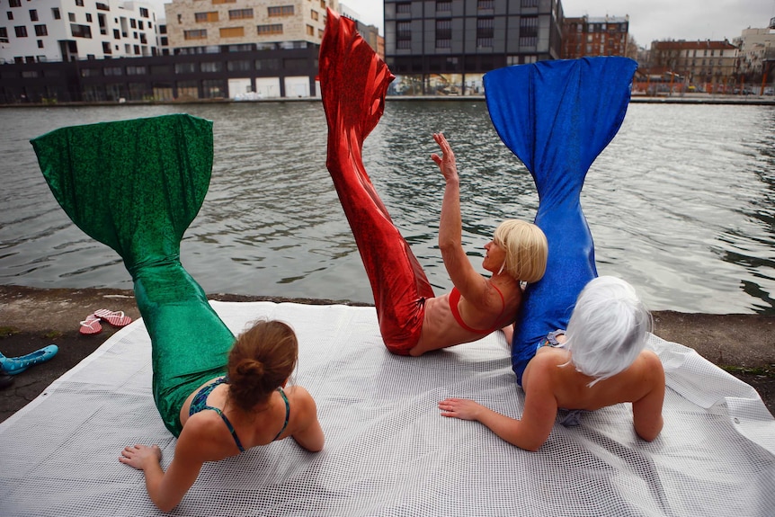 Benedicte, Marie Pascale and Sylvane, dressed as mermaid