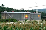 Two large oil storage tanks can be seen at an oil storage facility in China near the North Korea border.