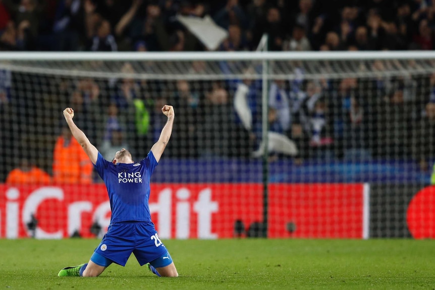 Leicester City's Christian Fuchs celebrates his team's Champions League win over Sevilla.