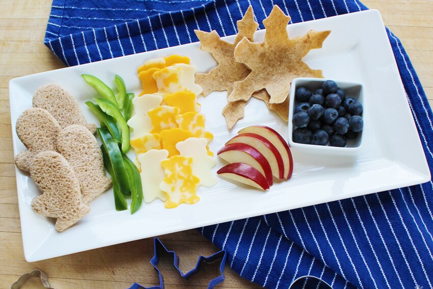 Healthy food options for children on a plate.