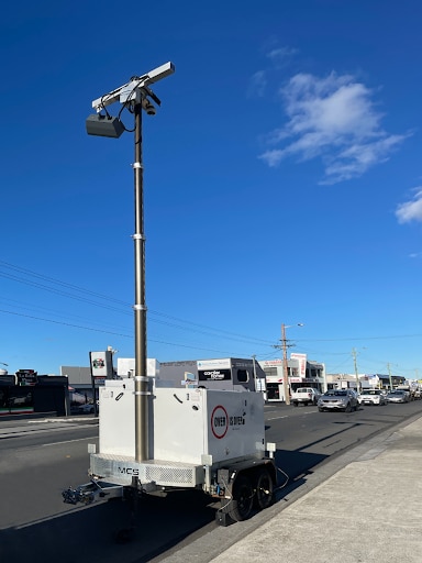 Mobile speed detection unit in place on urban road.