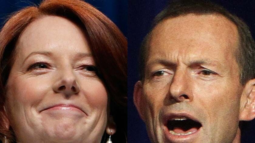 LtoR Prime Minister Julia Gillard and Opposition Leader Tony Abbott address their supporters