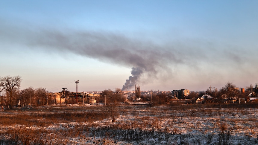 Smoke rises after shelling in Soledar, the site of heavy battles with Russian forces.