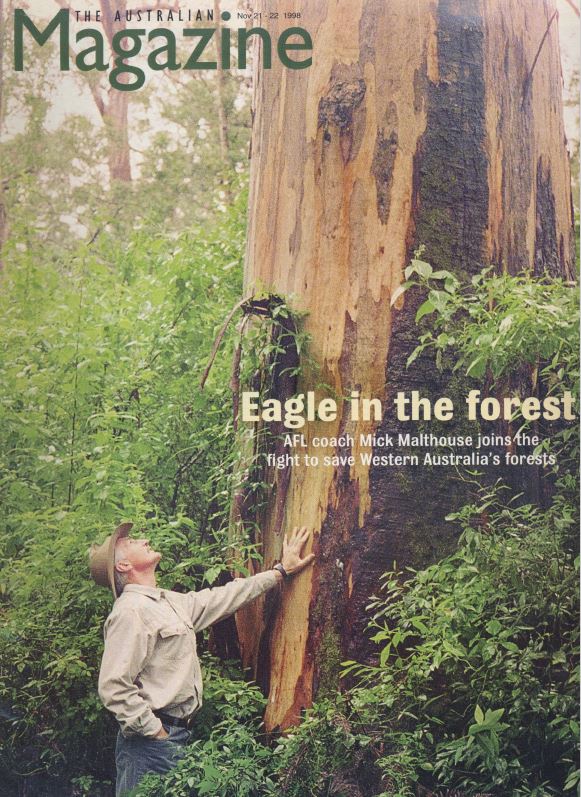 Image of cover of Weekend Aus mag with a man looking up at a large tree 