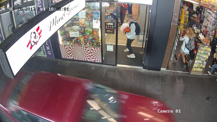 CCTV footage shows pedestrians jumping into shops to avoid the car
