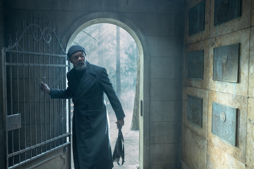 Samuel L Jackson as Nick Fury in a doorway. 