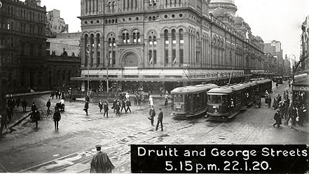 Trams run down Sydney's George Street in 1920