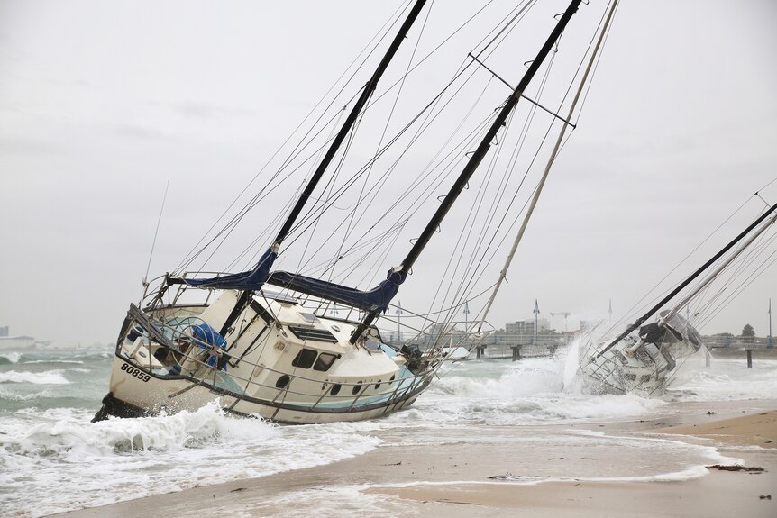 Two yachts washed up at Palm Beach in Rockingham.
