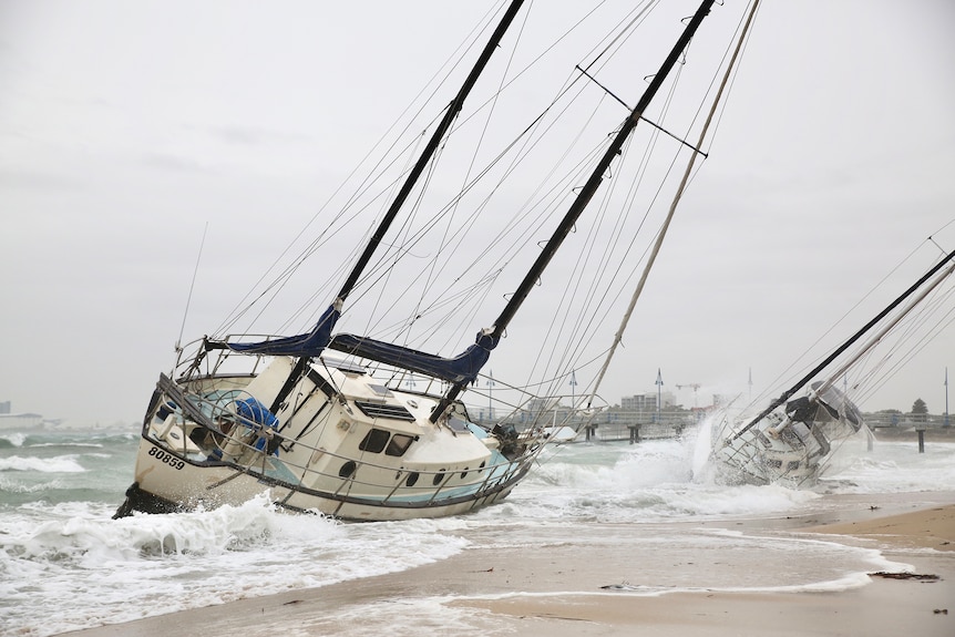 Two yachts washed up at Palm Beach in Rockingham.