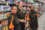 staff working in a grocery store