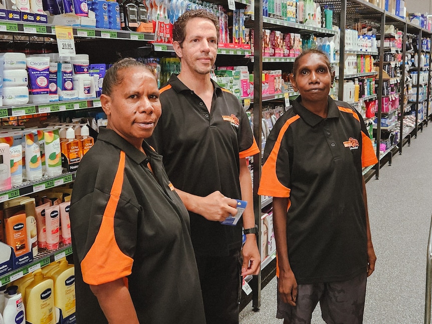 staff working in a grocery store