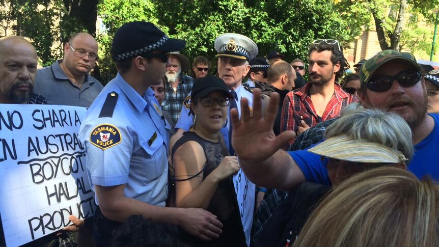 Police keep the peace at a Reclaim Australia protest in Hobart