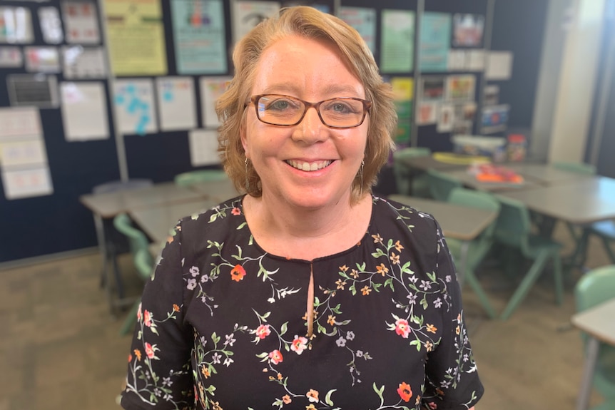 Sarah Matthews, a teacher, in an empty classroom