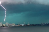 Spectacular storm... Lightning strikes a crane in Perth's CBD.
