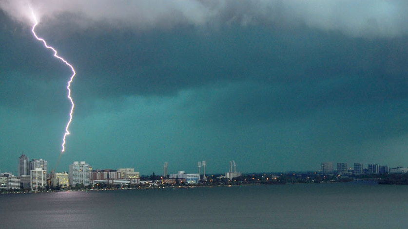 Spectacular storm... Lightning strikes a crane in Perth's CBD.