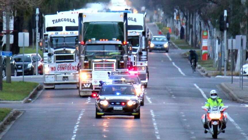 Police escorted two convoys of about 200 vehicles through the capital this morning.
