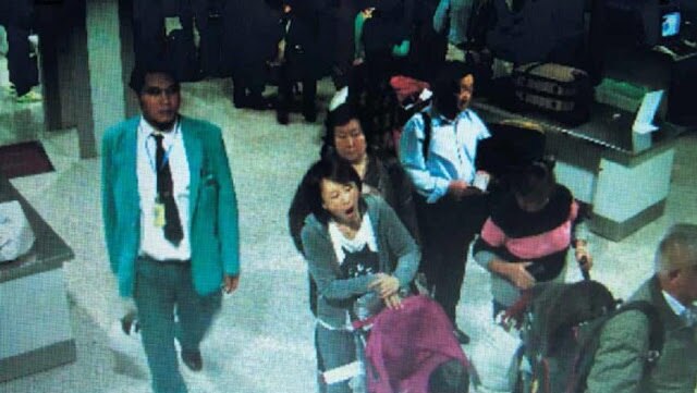 CCTV vision of man with lanyard from airport security at Malaysian airport before the ill fated MH370 flight.