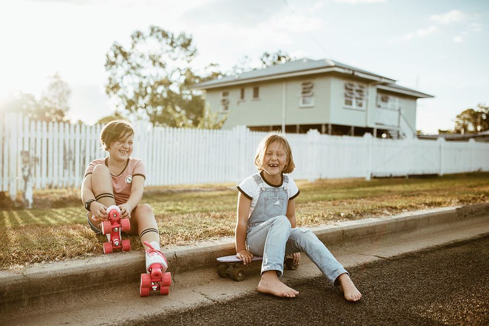 Two young girls enjoy some old-school skating fun in Texas, Queensland.
