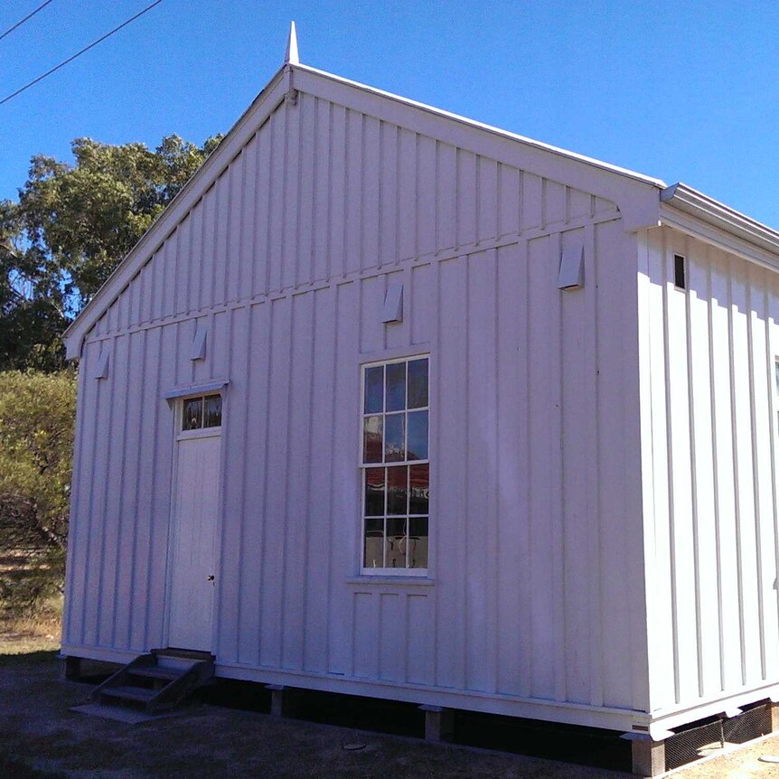 A white timber clad building as part of the former Torrens Island quarantine station, SA