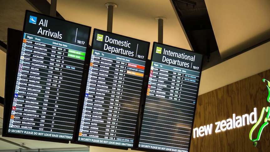 Departure boards at Christchurch Airport ahead of New Zealand's self-isolation policy.