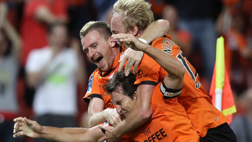 Besart Berisha of the Roar (L) has paid the price for a fiery post-match melee